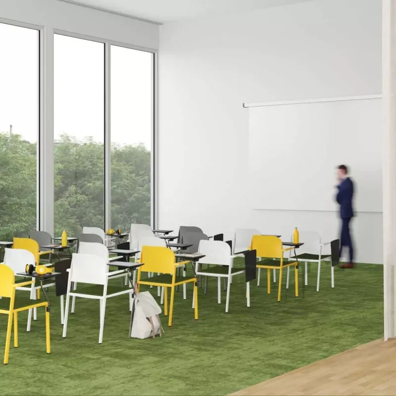 Chaise Romy de collectivité en ABS de couleur EOL avec accoudoirs et tablette écritoire